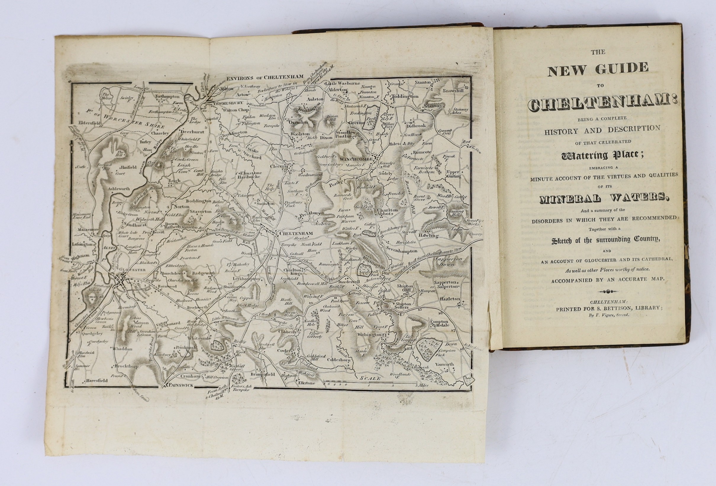 GLOUCS: The New Guide to Cheltenham...the Virtues and Qualities of its Mineral Waters...together with a Sketch of the Surrounding Country... folded map and 4 plates (2 folded); contemp. half calf and marbled boards, 12mo